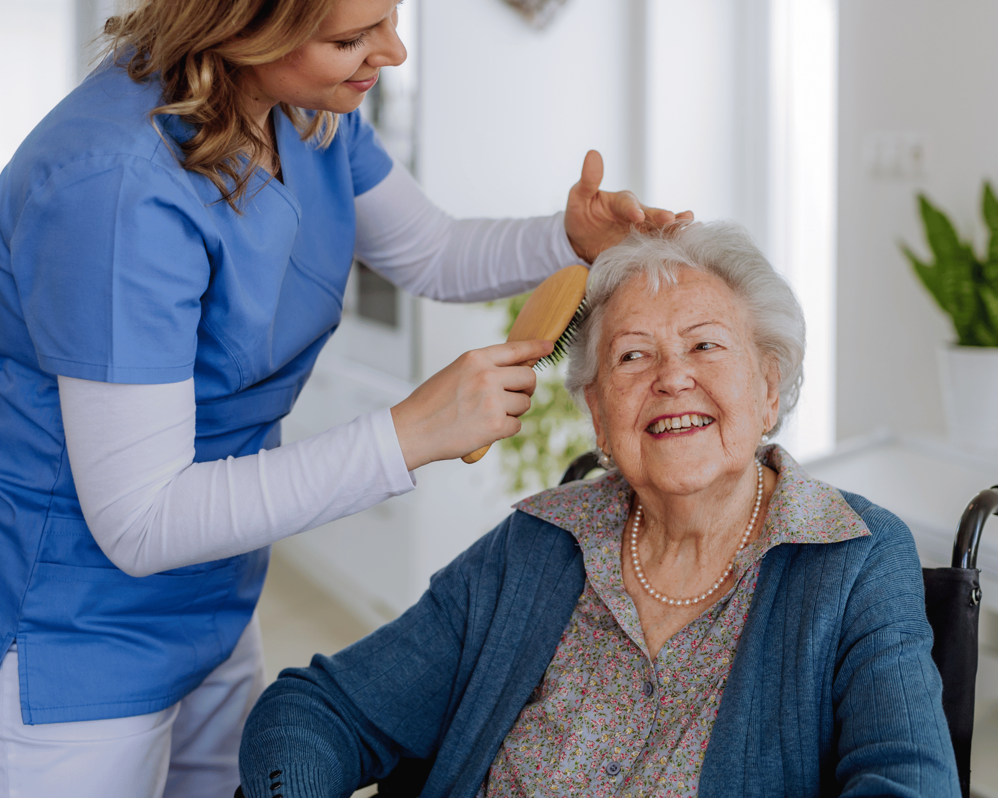 Caregiver helping a senior with a walker so family caregivers can rest
