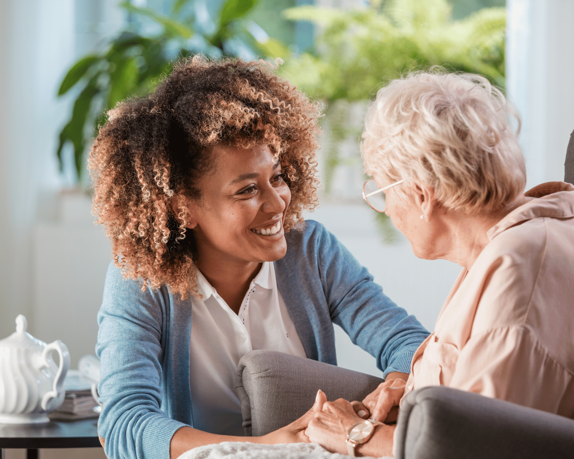 Caregiver playing a board game with a senior for companionship